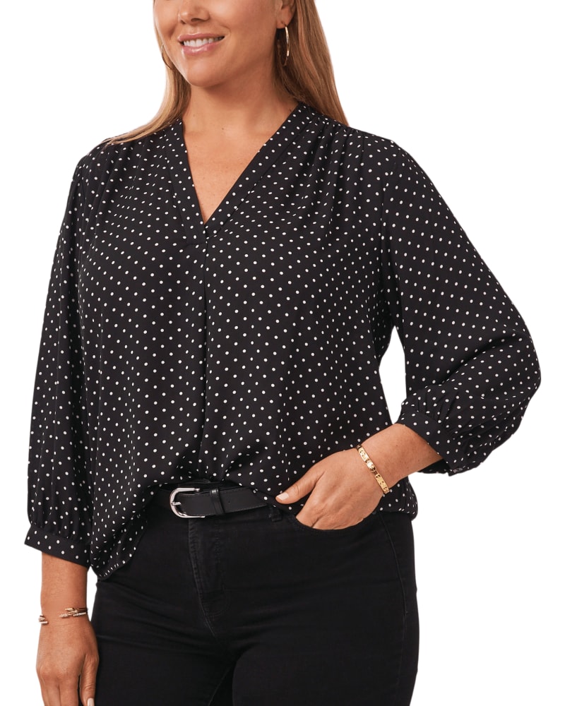 Front of a model wearing a size 1X Piper Poetic Dots Blouse in RICH BLACK by Vince Camuto. | dia_product_style_image_id:261973